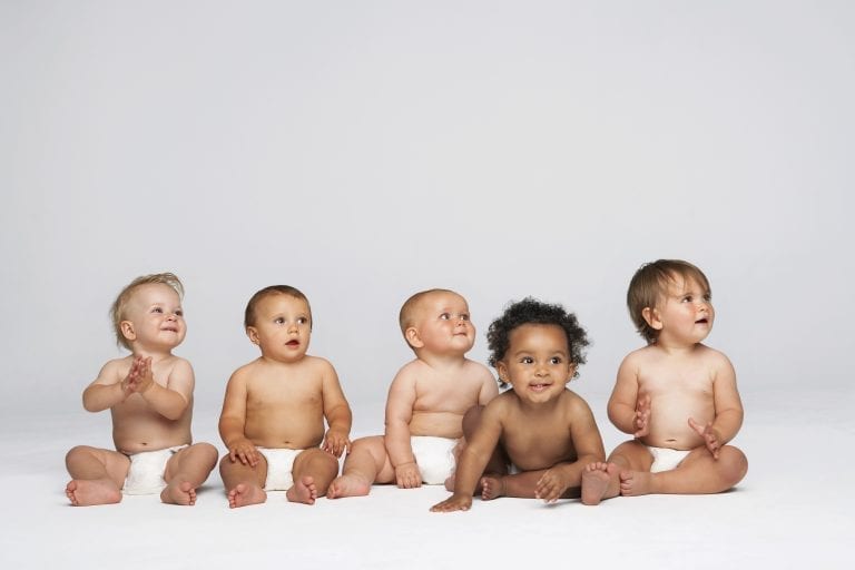 multicultural babies against white background